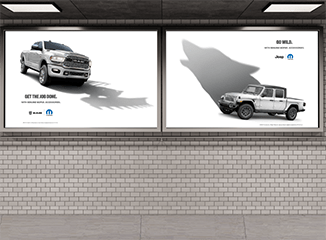 Mopar advertising posters framed on a wall